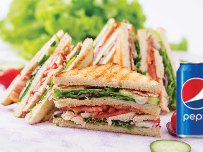 1 Club sandwich + 1 soft drink 355ml