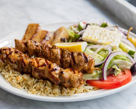 Plate of souvlaki pitas ( gyros or chicken ) + 1 soft drink